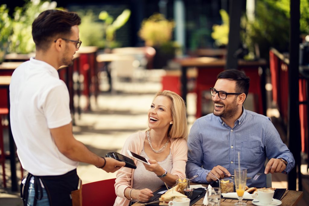 Happy customers pay with joy